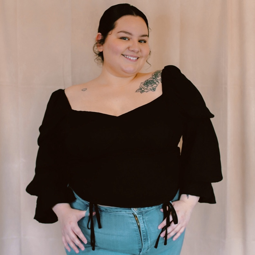 Darling top rubs true to size model is wearing a 1x